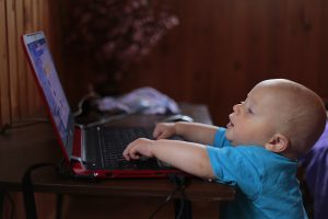 Baby at a computer